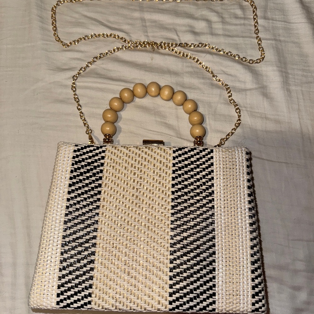 Elegant Black and Cream Woven Handbag